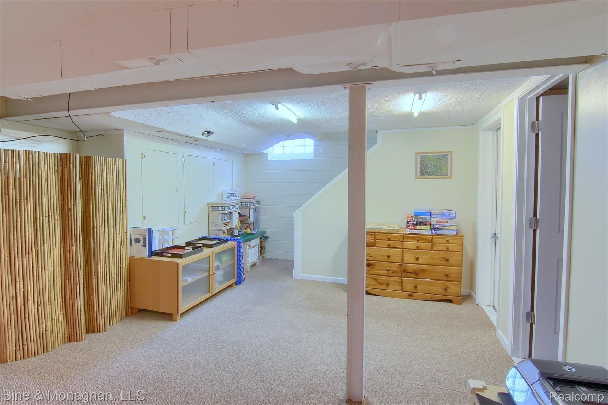1373 Cadieux Road Grosse Pointe, MI 48230 - Photo 20 of 29 20-Finished Lower Level 2nd View.jpg