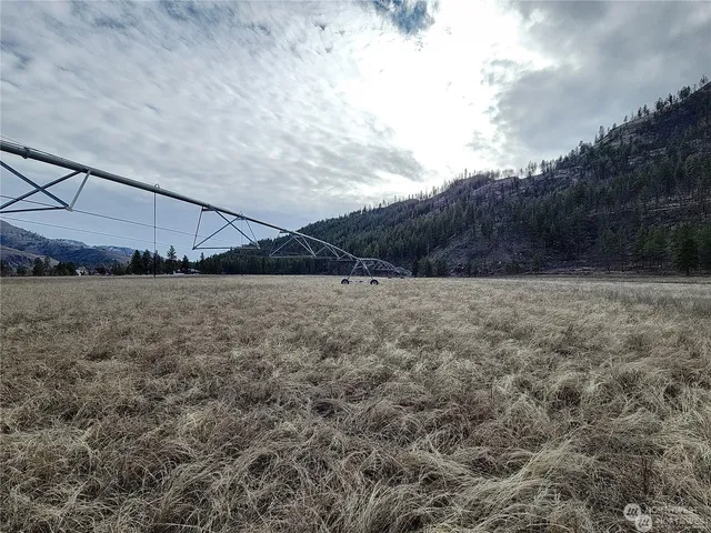 a view of large house with a big yard