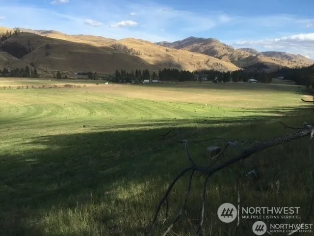 a view of an ocean from a mountain