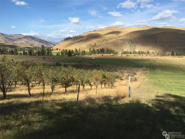 a view of an ocean from a mountain