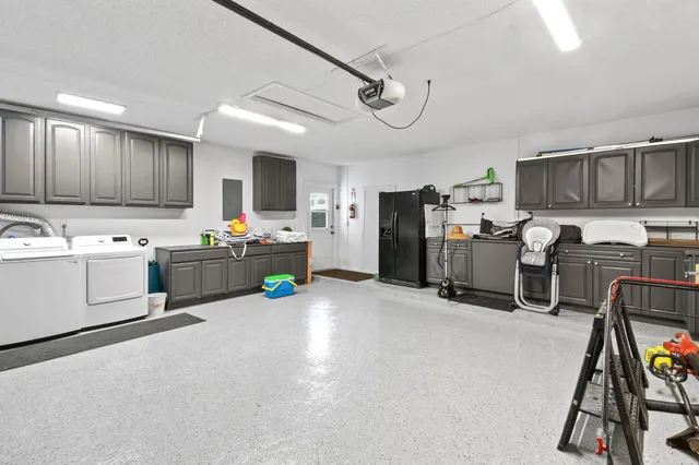 a view of a kitchen with workspace and a window