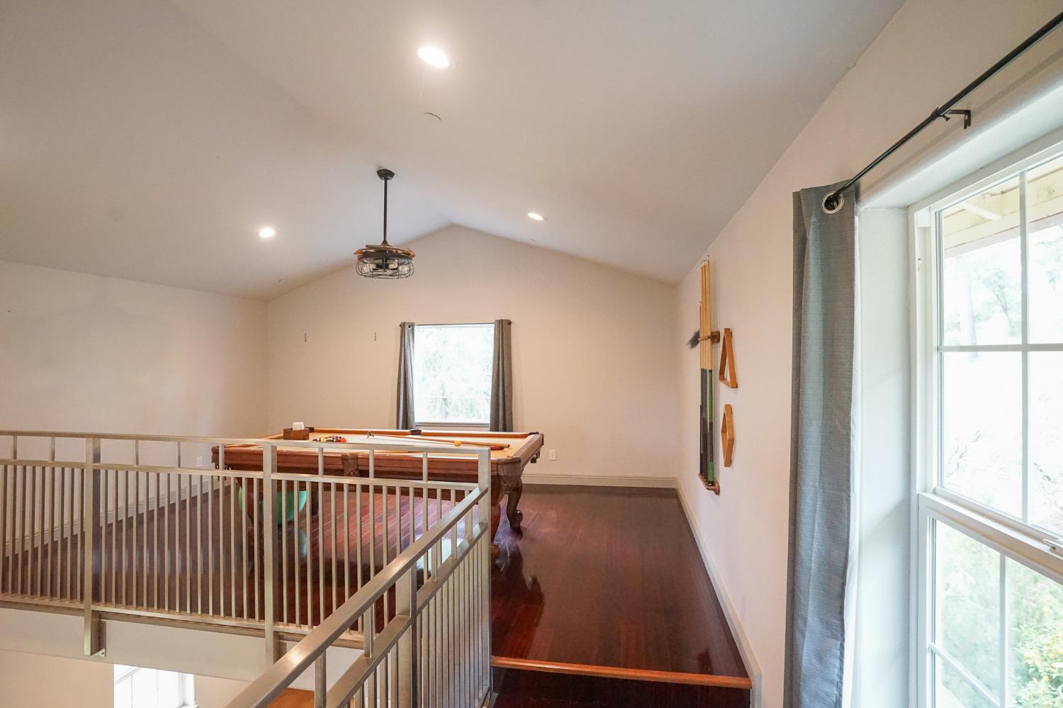 16375 Jesus Maria Road Mokelumne Hill, CA 95245 - Photo 21 of 39 a view of a hallway with windows