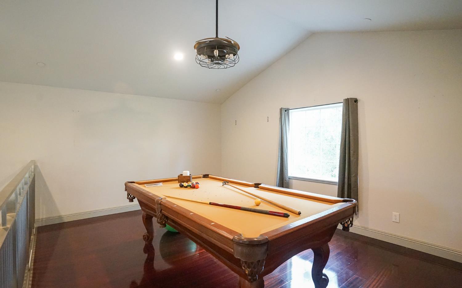 16375 Jesus Maria Road Mokelumne Hill, CA 95245 - Photo 22 of 39 a room with pool table and wooden floor