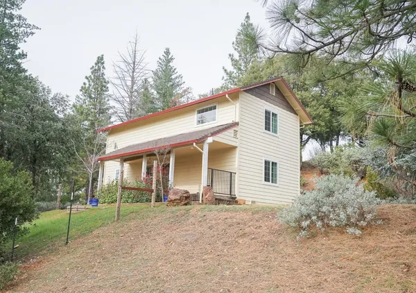 a front view of a house with a porch