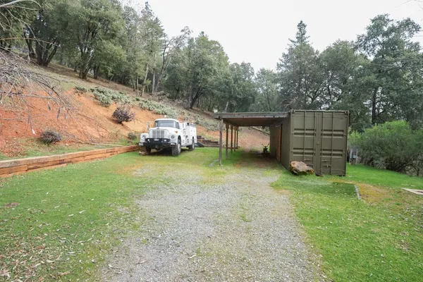 a view of a backyard with a garden