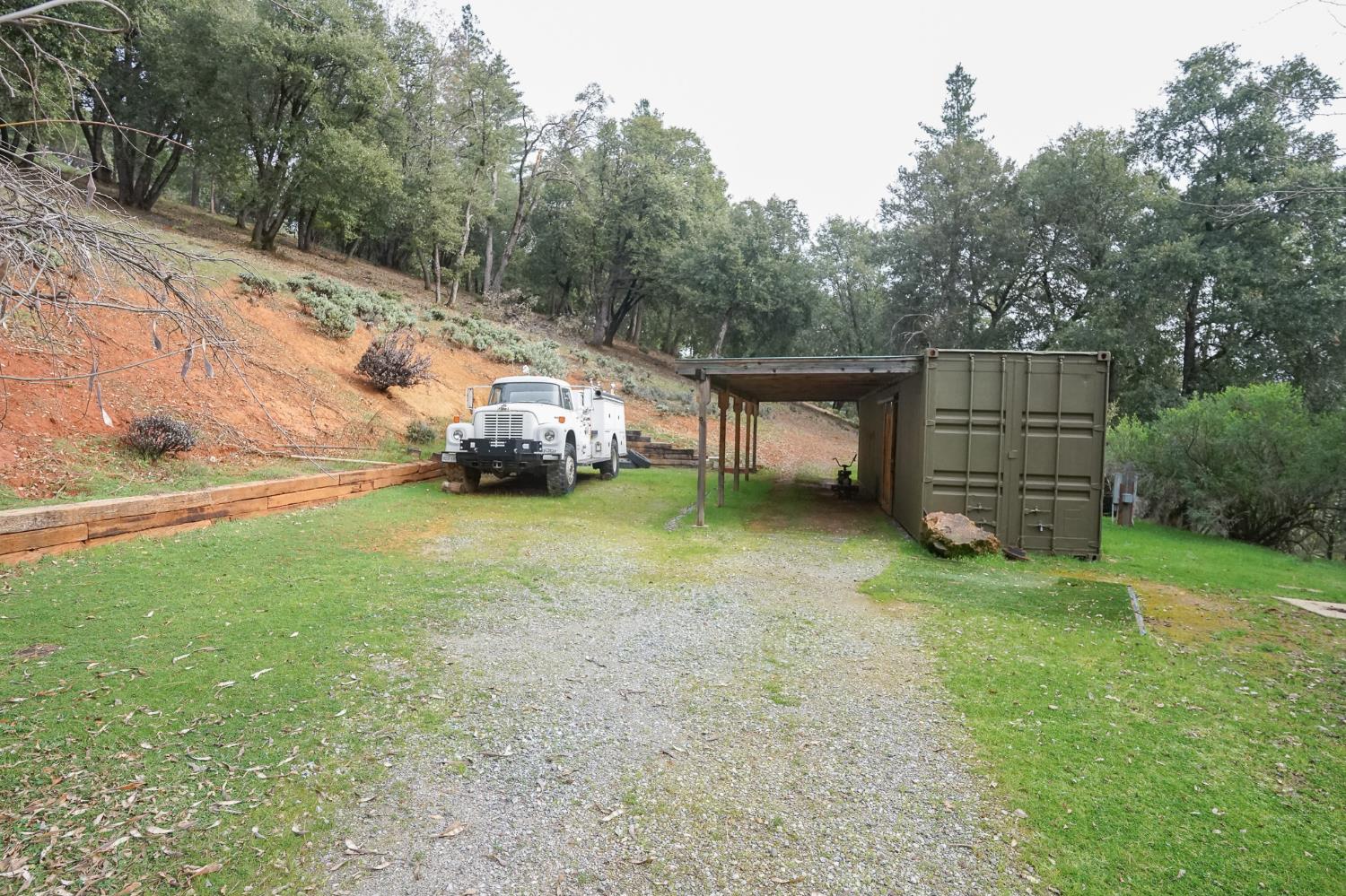 16375 Jesus Maria Road Mokelumne Hill, CA 95245 - Photo 34 of 39 a view of a backyard with a garden