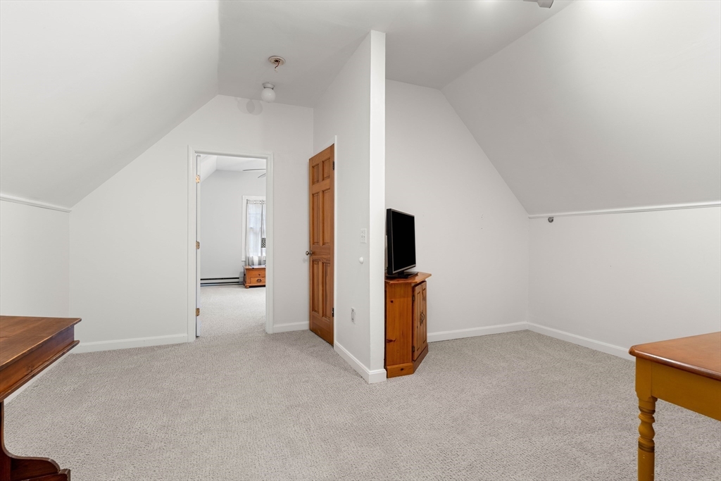 21 Hammond Street Rowley, MA 01969 - Photo 11 of 26 a view of a livingroom with an empty space