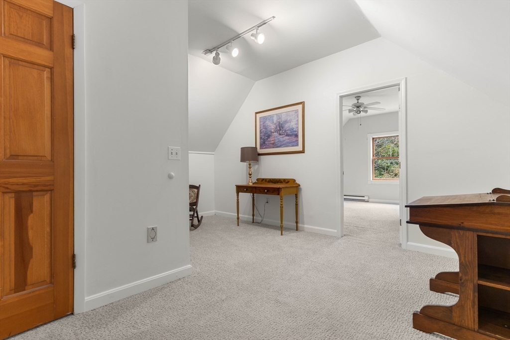 21 Hammond Street Rowley, MA 01969 - Photo 12 of 26 a room with furniture and a window