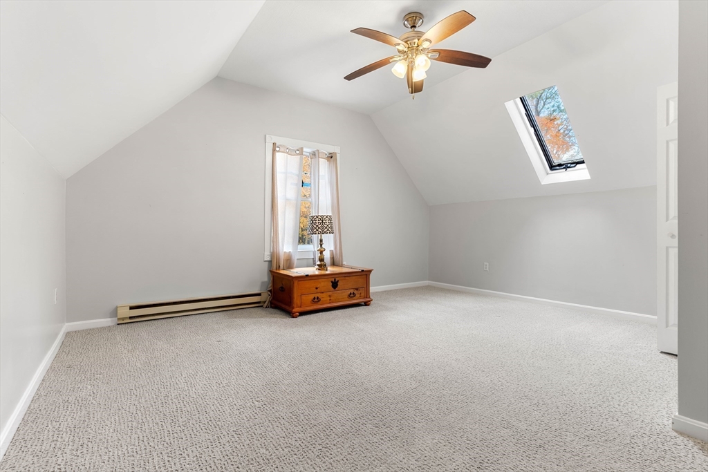 21 Hammond Street Rowley, MA 01969 - Photo 14 of 26 an empty room with windows and fan