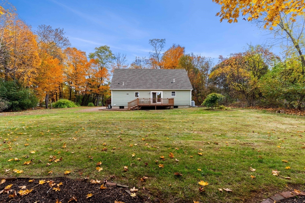21 Hammond Street Rowley, MA 01969 - Photo 2 of 26 a view of a house with a yard