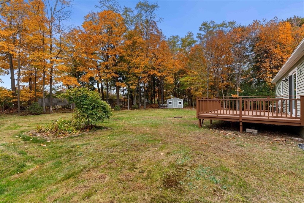 21 Hammond Street Rowley, MA 01969 - Photo 22 of 26 a view of a house with backyard and trees