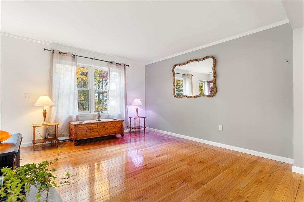 21 Hammond Street Rowley, MA 01969 - Photo 8 of 26 a bedroom with furniture and a window