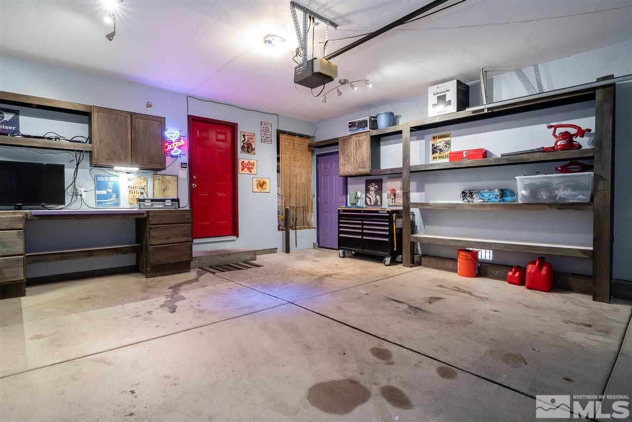 1030 Backer Way Reno, NV 89523 - Photo 19 of 25 a room with furniture and a flat screen tv
