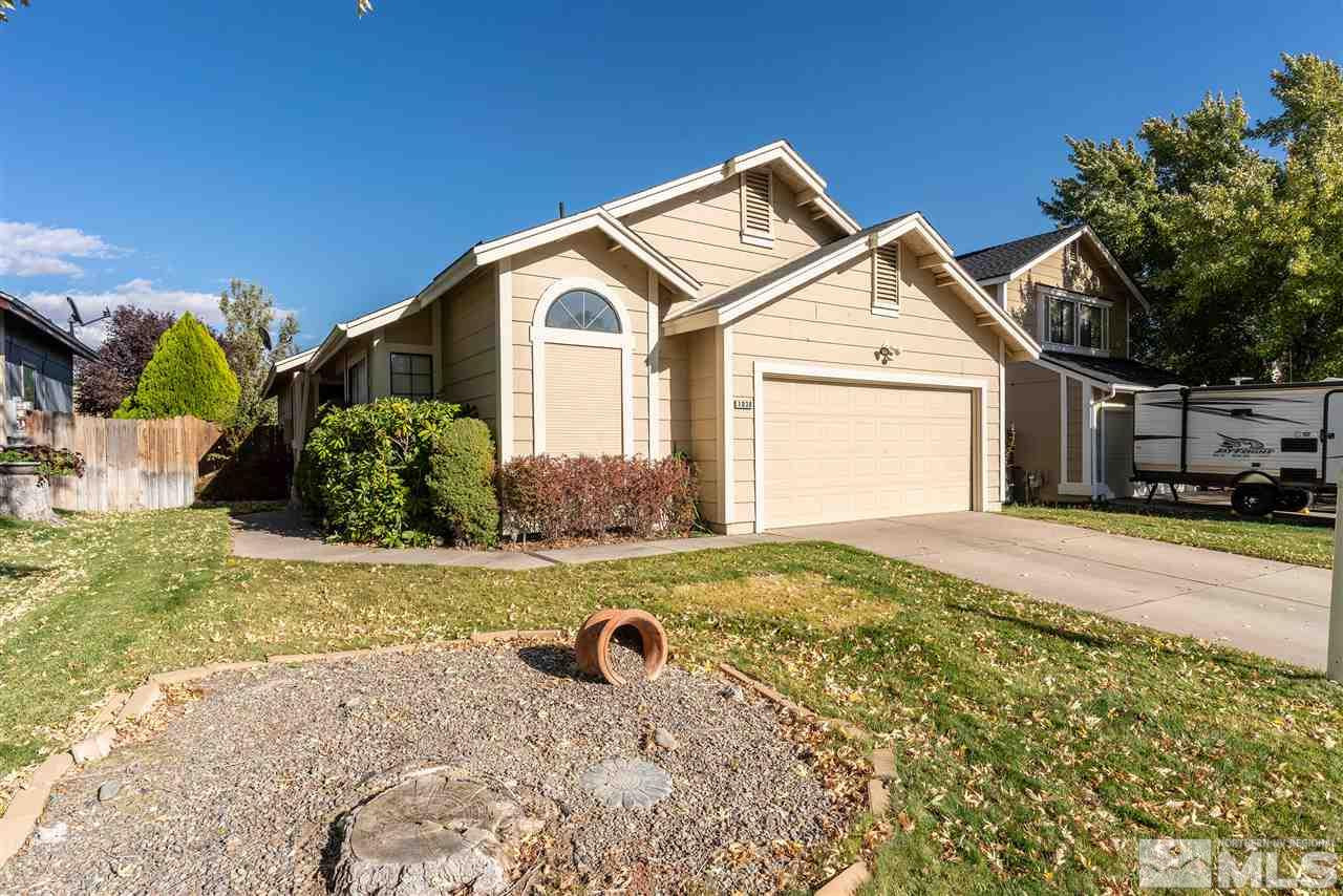 1030 Backer Way Reno, NV 89523 - Photo 2 of 25 a front view of a house with a yard