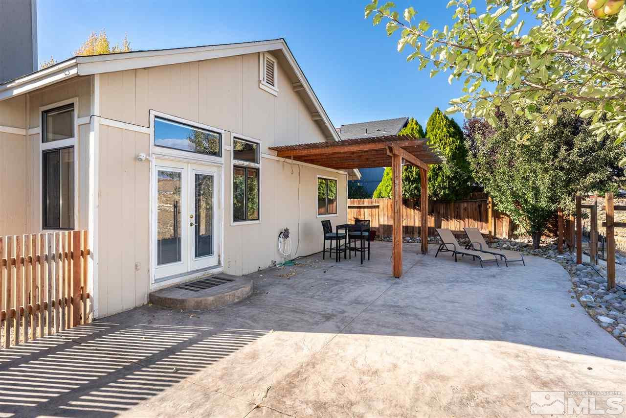 1030 Backer Way Reno, NV 89523 - Photo 22 of 25 a view of a house with backyard porch and sitting area