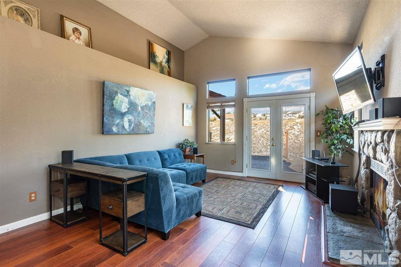 1030 Backer Way Reno, NV 89523 - Photo 5 of 25 a living room with furniture and a wooden floor