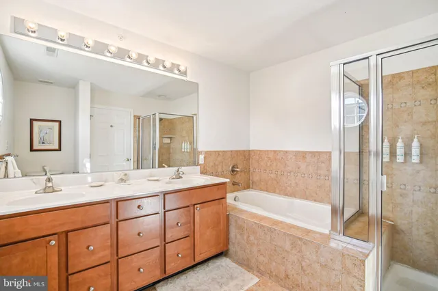 a bathroom with a toilet shower and a sink