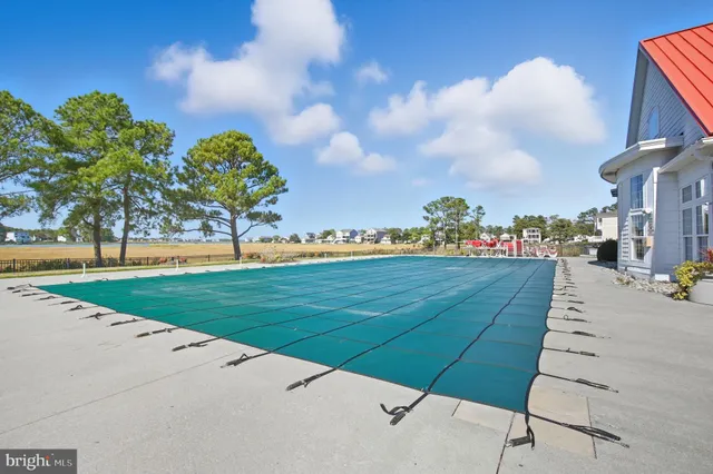 a view of a living room and kitchen