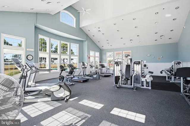 a view of a dining room with furniture and a table