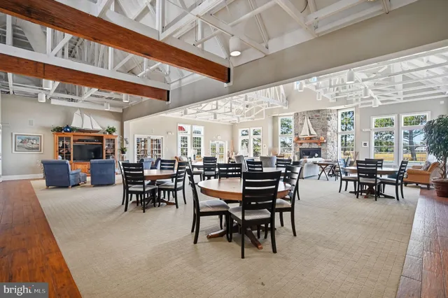 a view of a dinning table and chairs in the patio