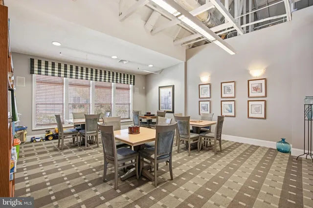 a large living room with large windows