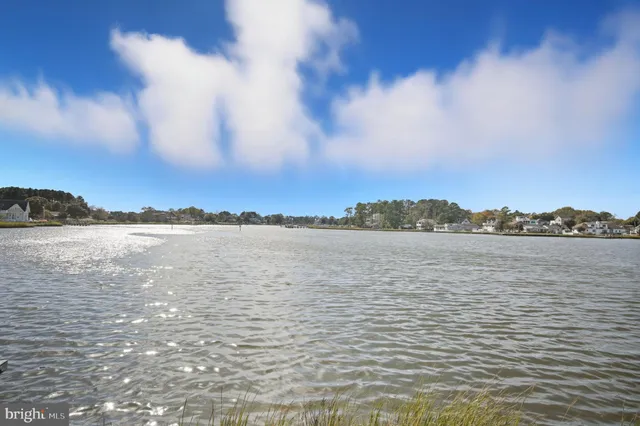 a view of a balcony with wooden floor