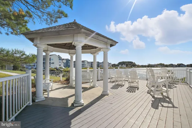 a view of a chairs on the roof deck