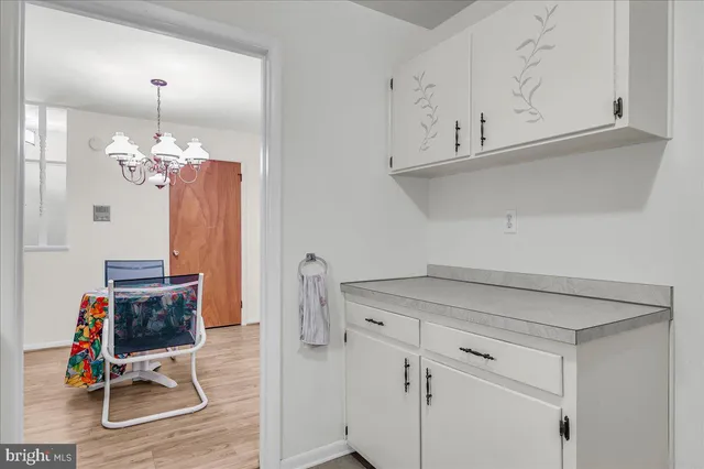 a view of dining room and wooden floor