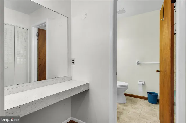 a bathroom with a toilet