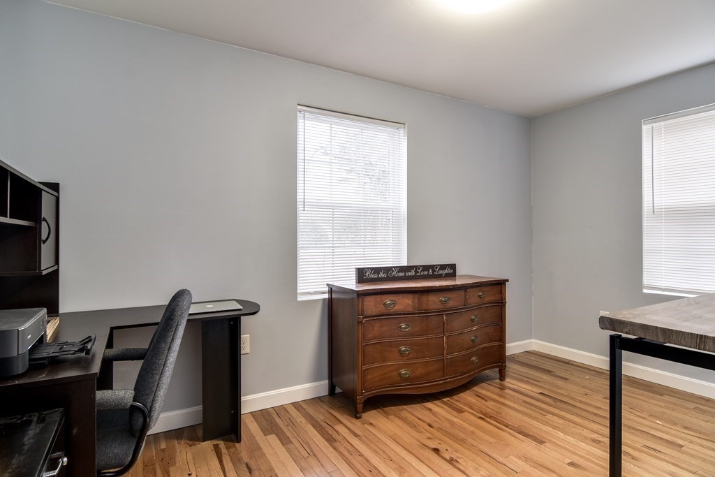 514 Edgell Road Framingham, MA 01701 - Photo 13 of 35 a view of a workspace with furniture and a window