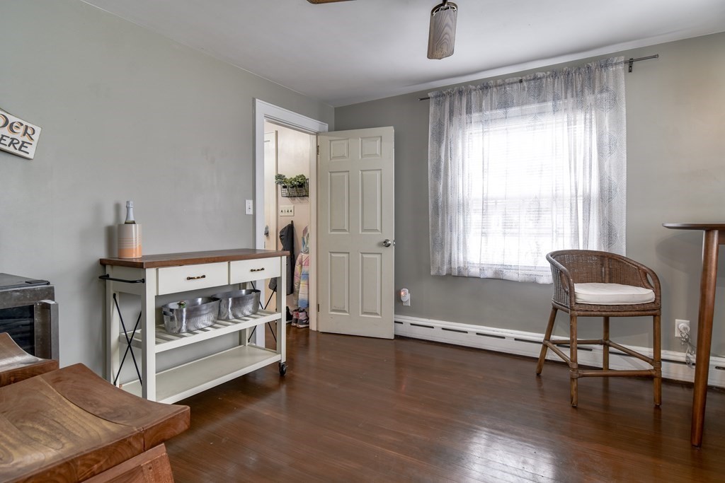 514 Edgell Road Framingham, MA 01701 - Photo 15 of 35 a bedroom with furniture and a window