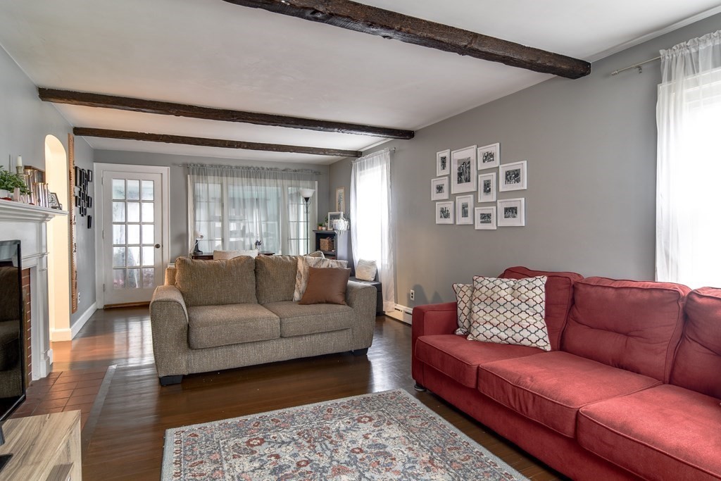 514 Edgell Road Framingham, MA 01701 - Photo 18 of 35 a living room with furniture and a couch