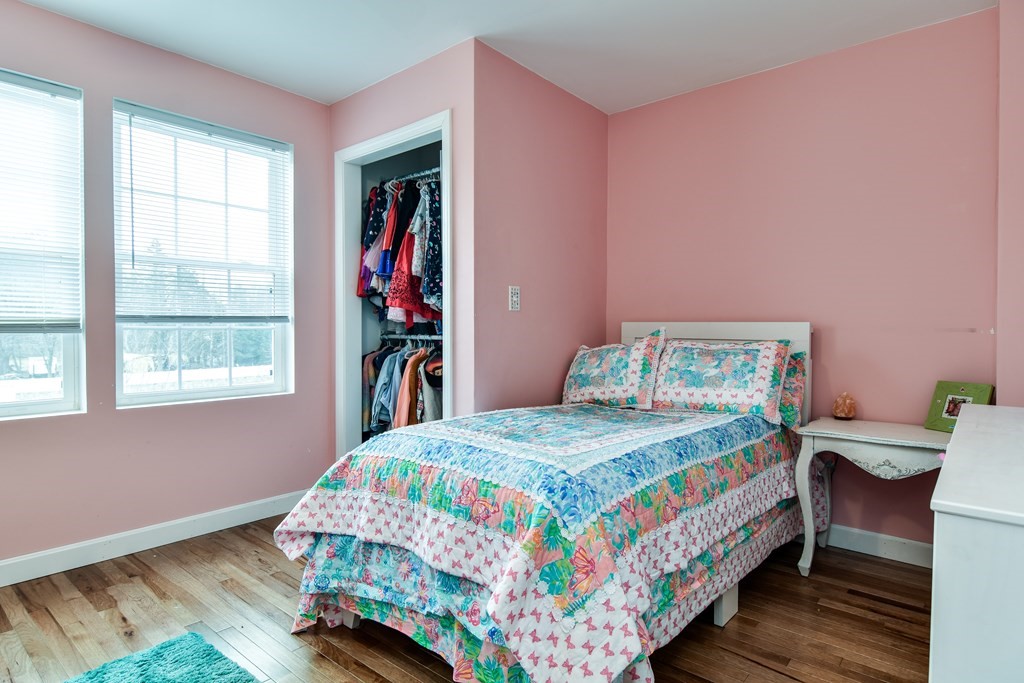 514 Edgell Road Framingham, MA 01701 - Photo 27 of 35 a bedroom with a bed and a window