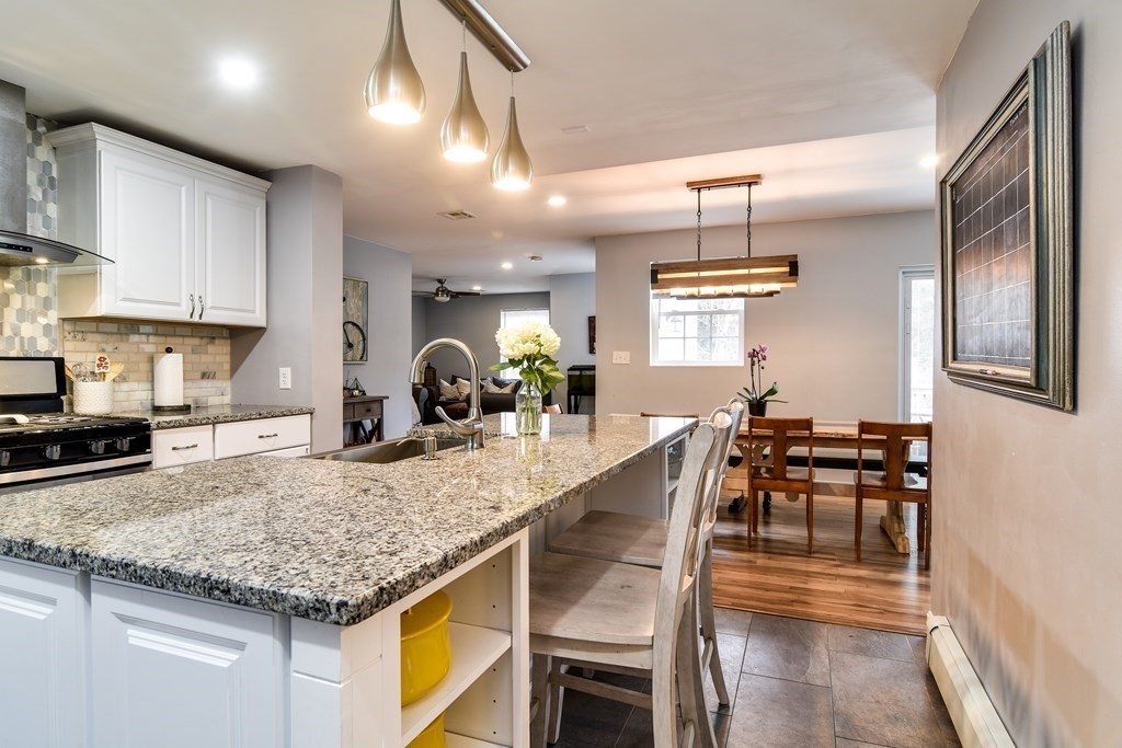 514 Edgell Road Framingham, MA 01701 - Photo 6 of 35 a kitchen with granite countertop lots of counter top space