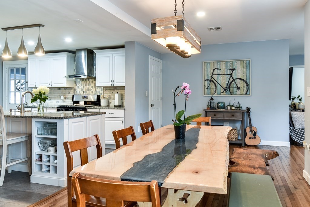 514 Edgell Road Framingham, MA 01701 - Photo 9 of 35 a dining room with furniture and wooden floor