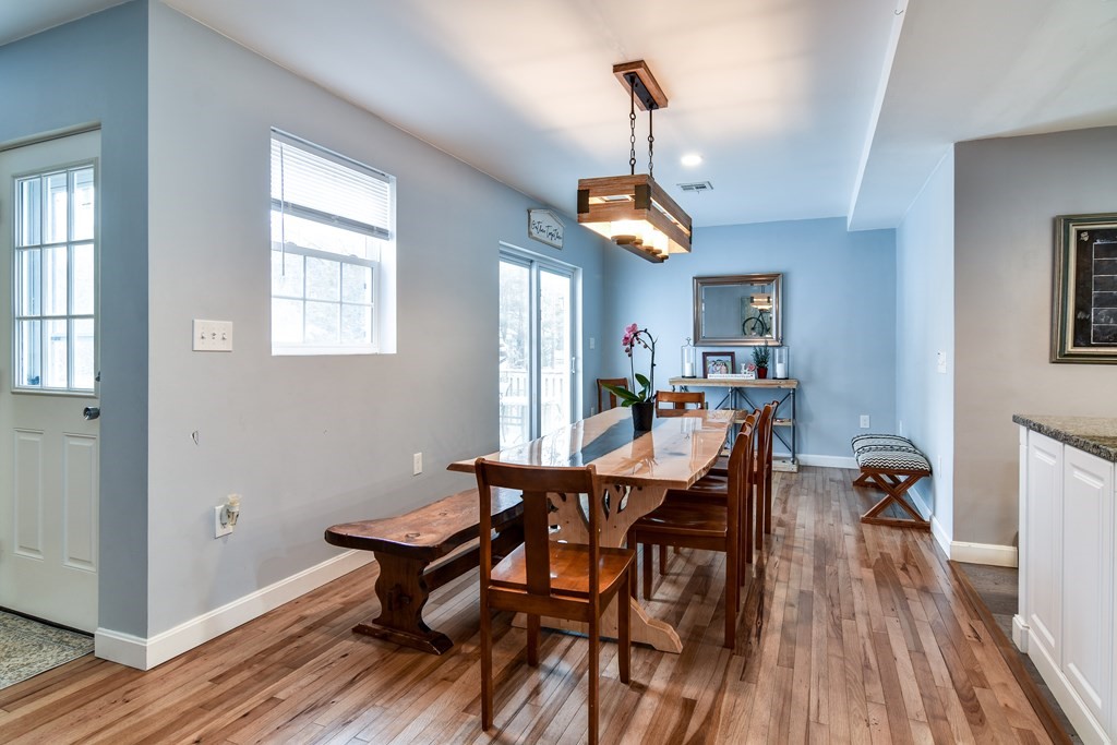 514 Edgell Road Framingham, MA 01701 - Photo 10 of 35 a view of a dining room with furniture window and wooden floor