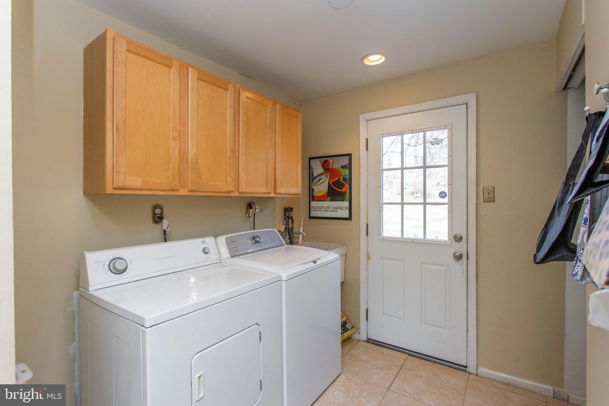 8813 Wainwright Road Glenside, PA 19038 - Photo 14 of 25 Laundry Room with Pantry Closet