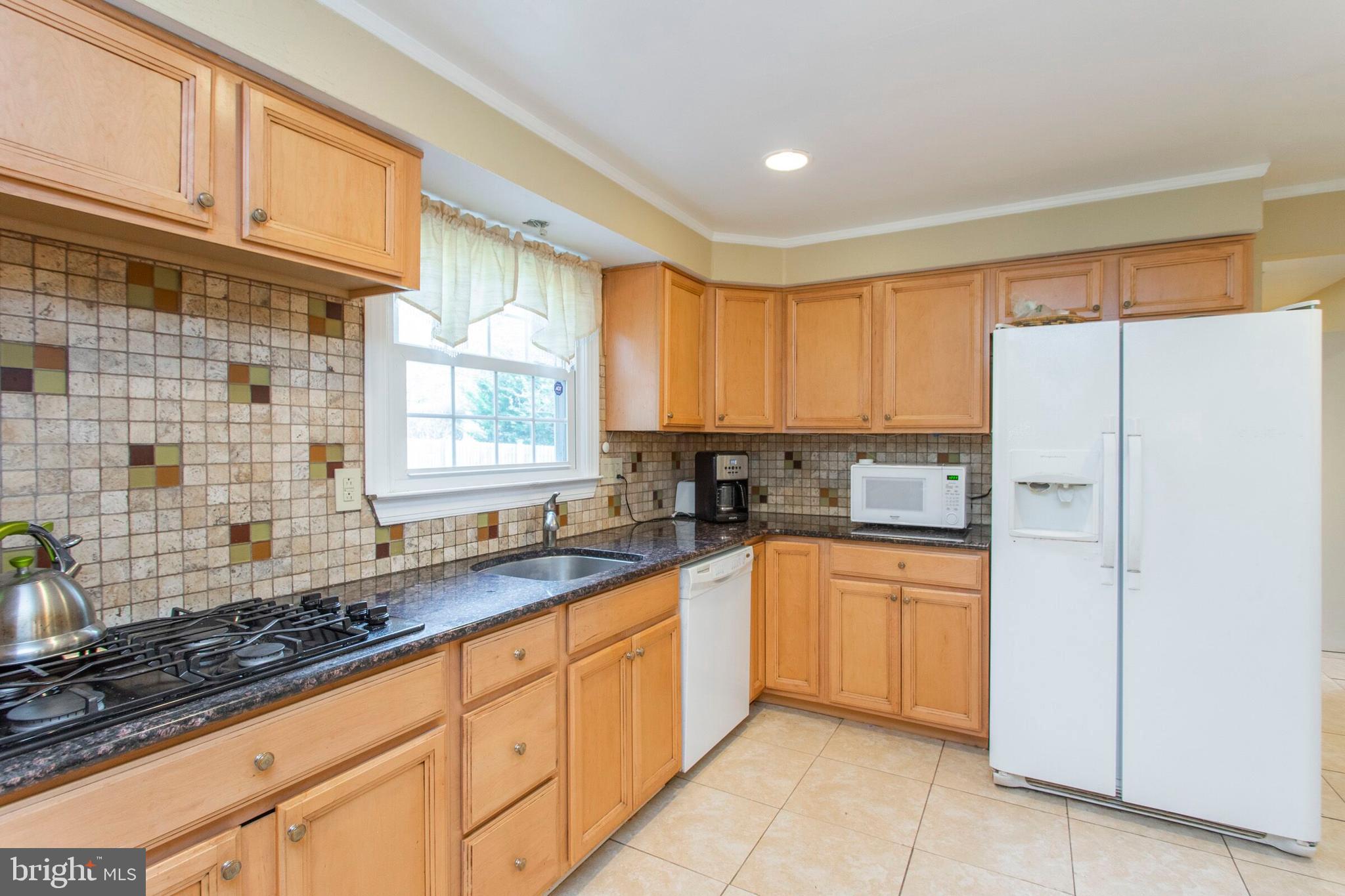 8813 Wainwright Road Glenside, PA 19038 - Photo 10 of 25 Newer Appliances and Gas Cooktop