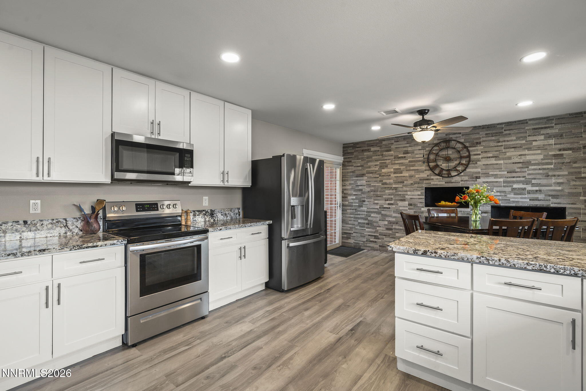 150 Mayberry Drive Reno, NV 89509 - Photo 11 of 40 a kitchen with a sink stove and refrigerator