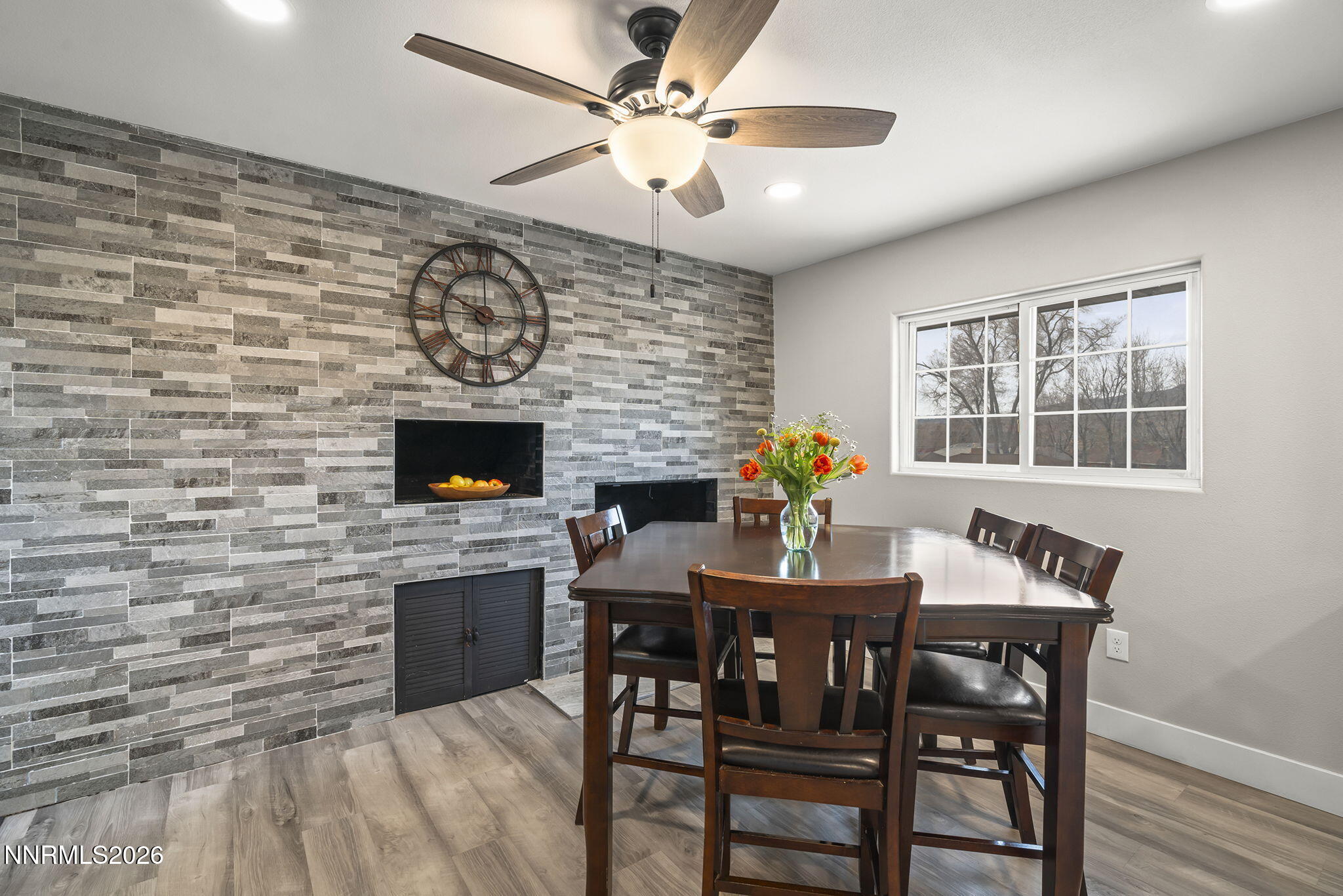 150 Mayberry Drive Reno, NV 89509 - Photo 14 of 40 a view of a dining room with furniture window and wooden floor