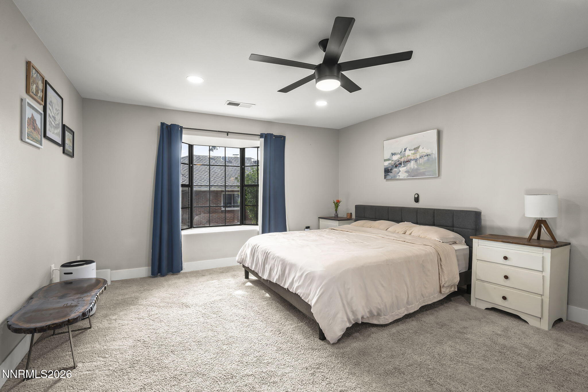 150 Mayberry Drive Reno, NV 89509 - Photo 18 of 40 a bedroom with a large bed and a window