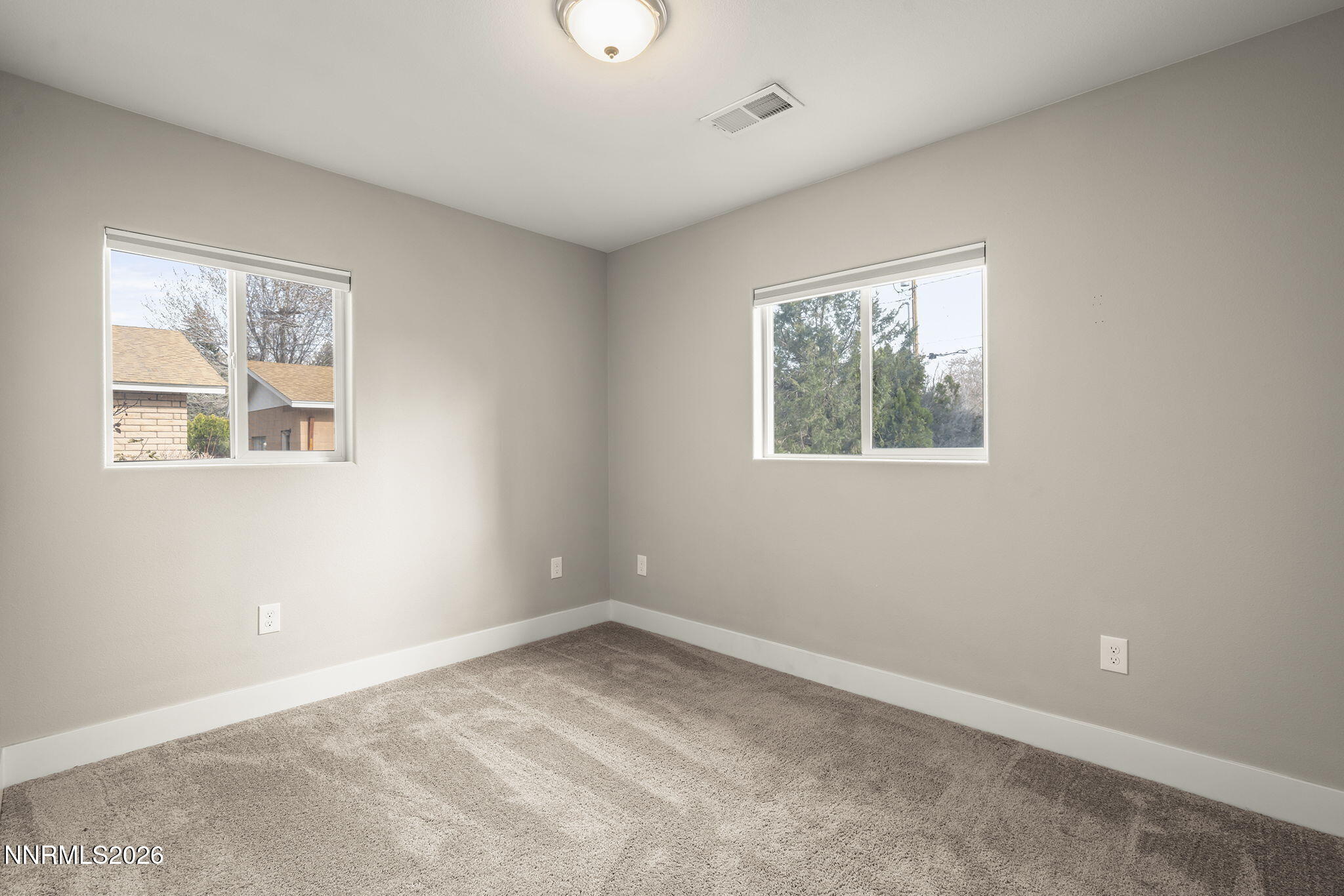 150 Mayberry Drive Reno, NV 89509 - Photo 22 of 40 a view of empty room with windows