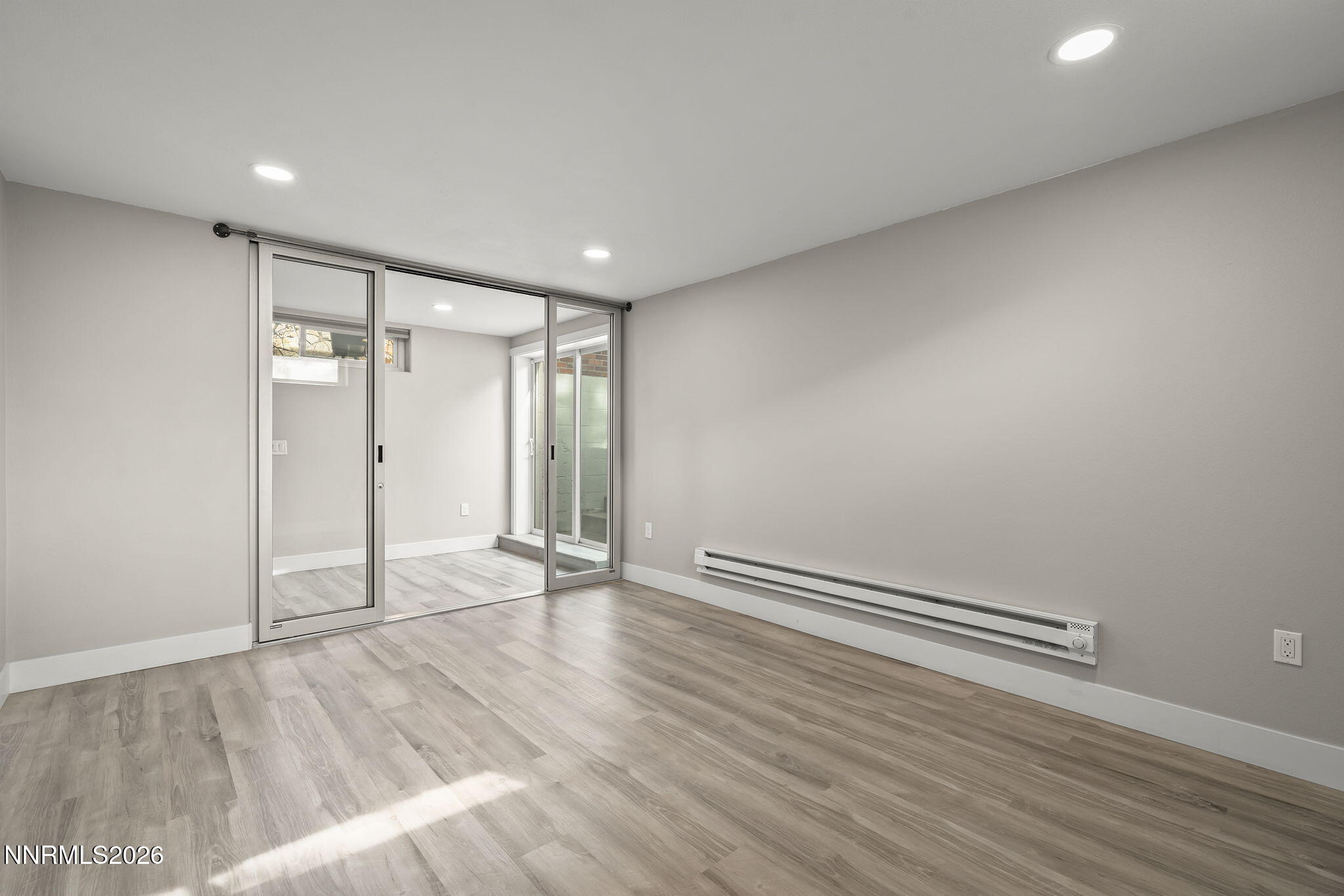 150 Mayberry Drive Reno, NV 89509 - Photo 26 of 40 a view of an empty room with wooden floor