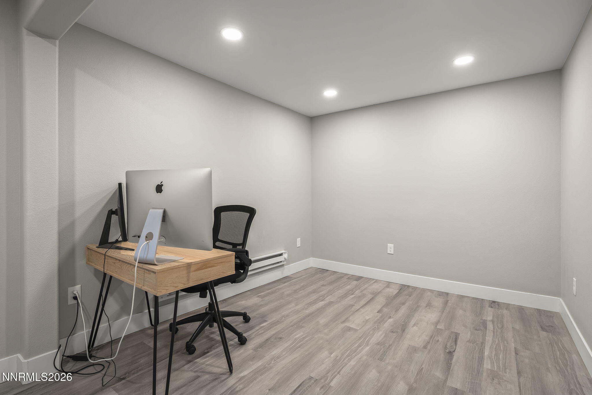 150 Mayberry Drive Reno, NV 89509 - Photo 27 of 40 a view of a workspace with furniture and wooden floor