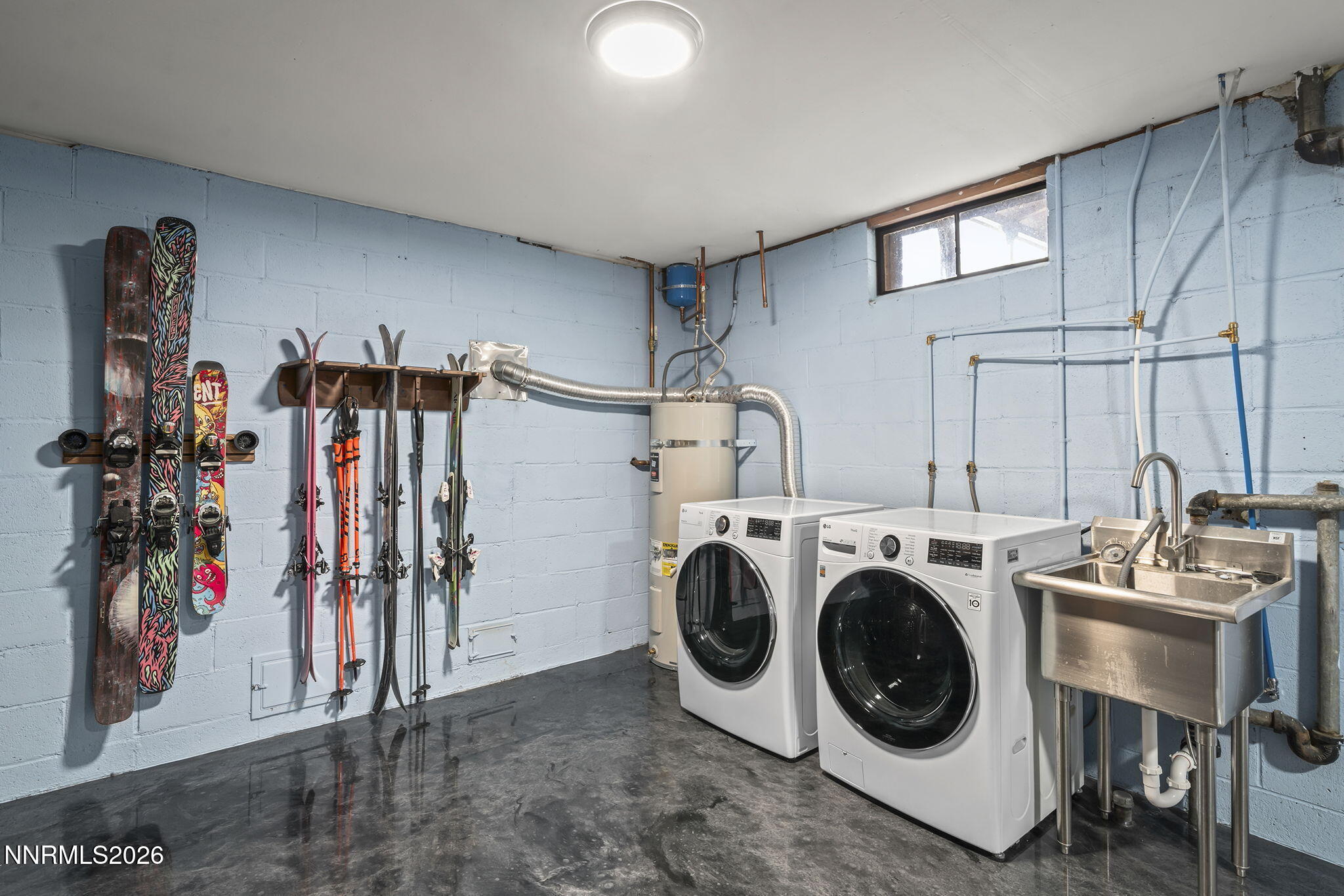 150 Mayberry Drive Reno, NV 89509 - Photo 30 of 40 a view of a storage and utility room with two washing machine