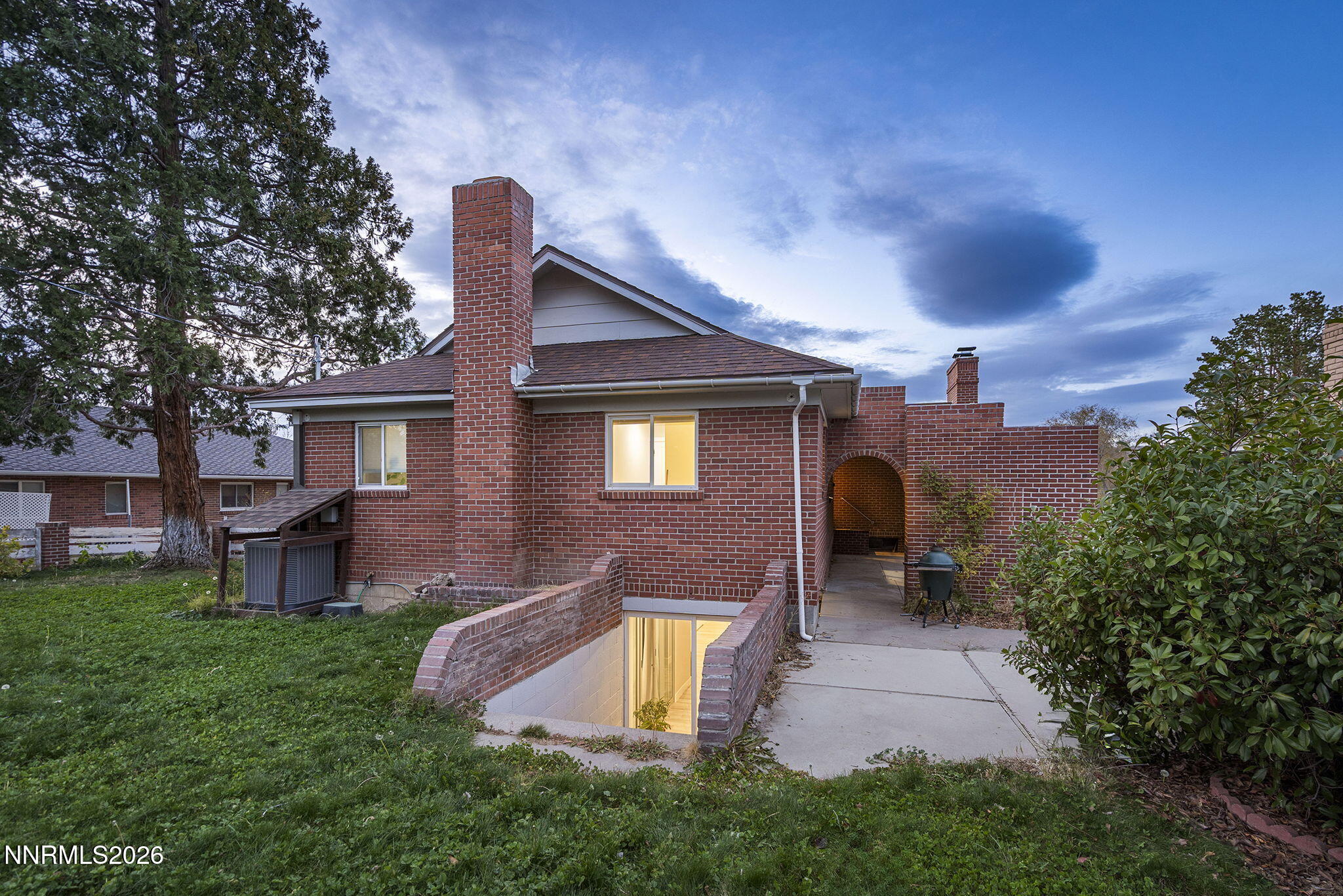 150 Mayberry Drive Reno, NV 89509 - Photo 4 of 40 a view of a house with a yard and sitting area