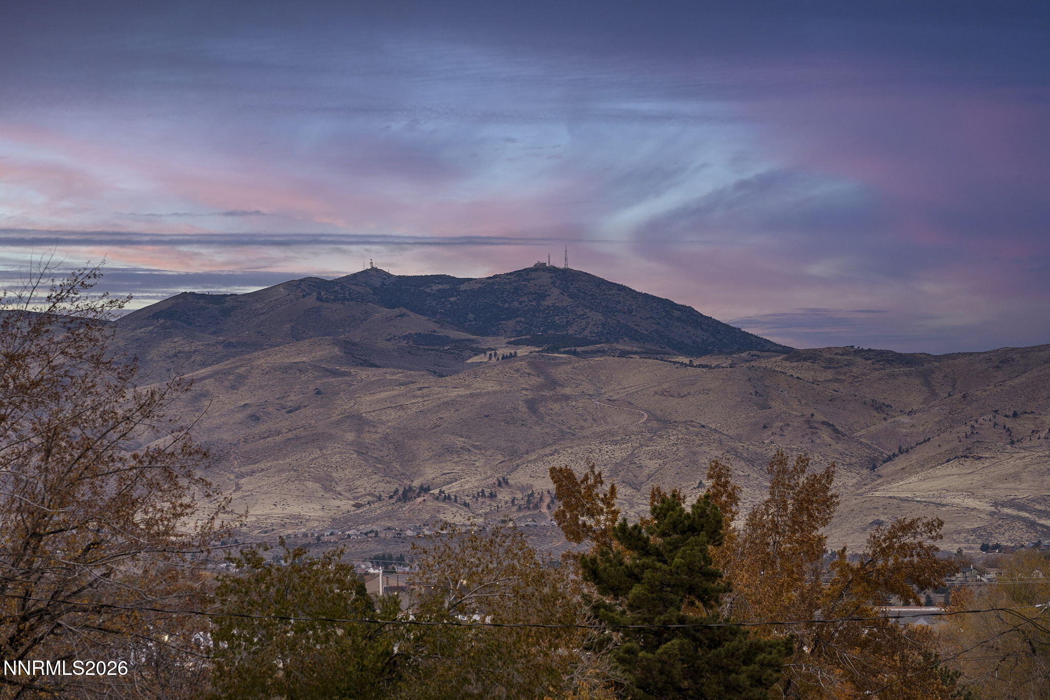150 Mayberry Drive Reno, NV 89509 - Photo 6 of 40 a view of mountain with sunset