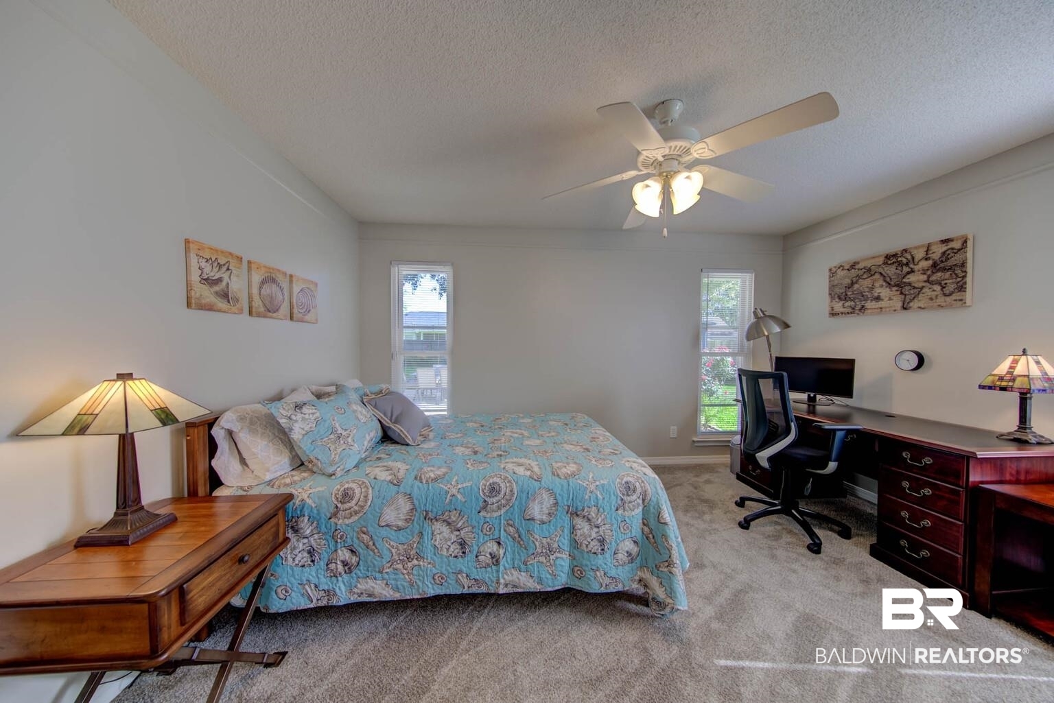 304 West Palm Avenue Foley, AL 36535 - Photo 11 of 18 Bedroom with light carpet, ceiling fan, and a textured ceiling