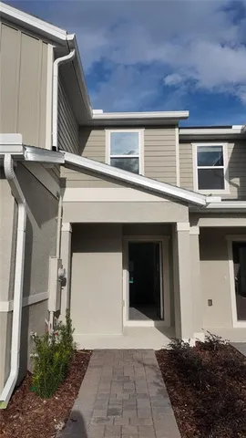 a front view of a house with a garage
