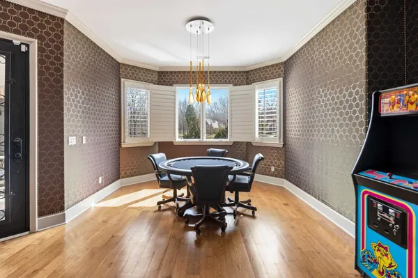 a room with projector and furniture